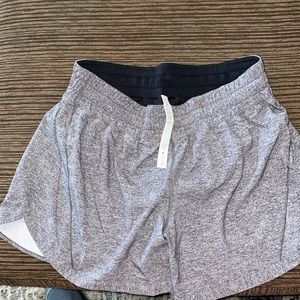 Lulu lemon womens track that 5” short.  New without tags.  Dark grey